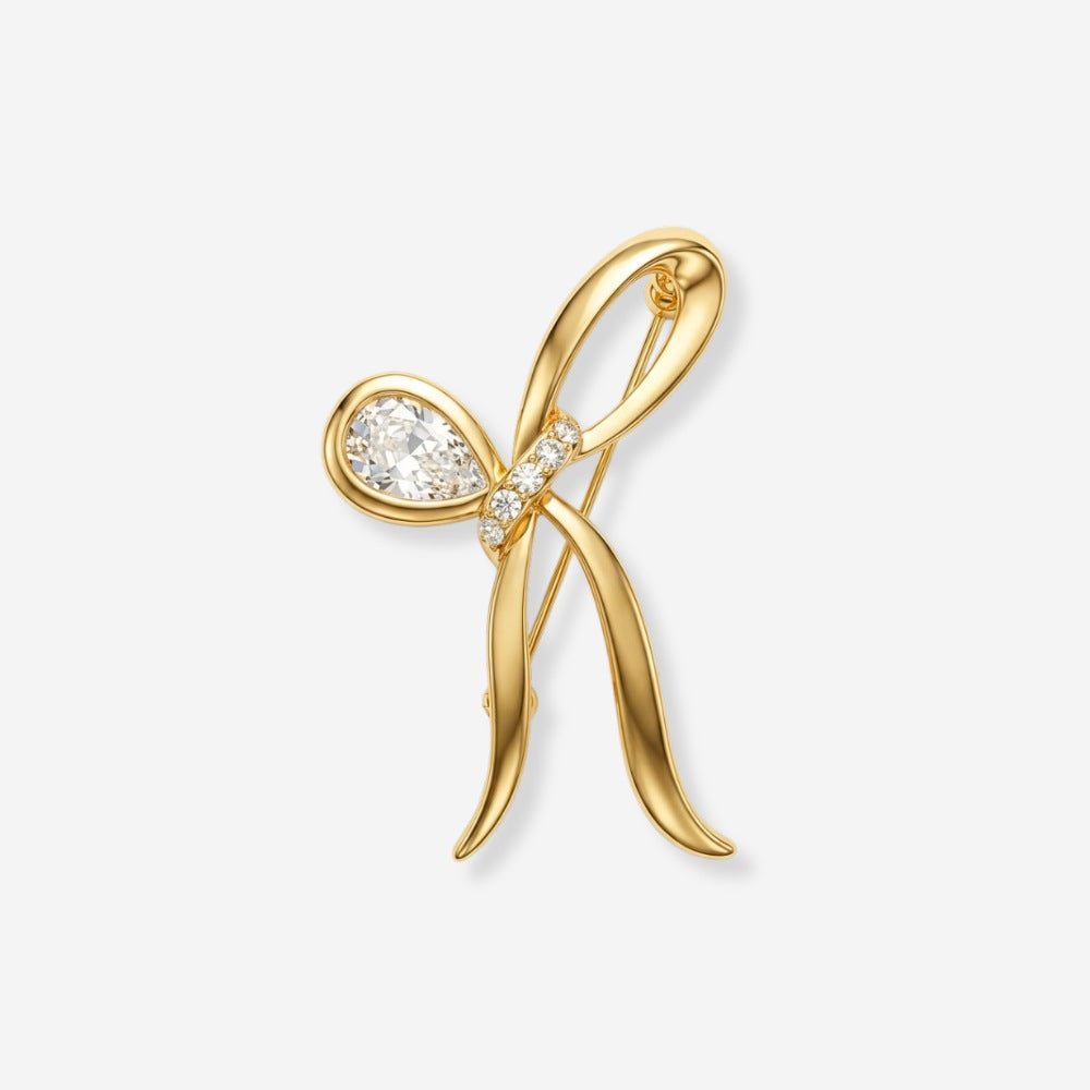  1980S DAINTY RIBBON CRYSTAL BOW BROOCH